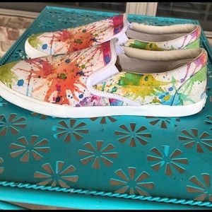 Colorful paint splattered shoes